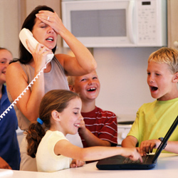 Frustrated mother with children on phone